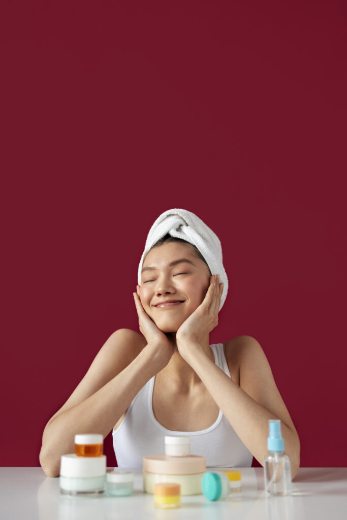 Front view korean woman doing skin care routine